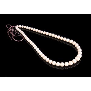 One angel skin graduated beads loose strands ... 