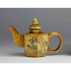 An engraved bone teapot;XX century; 6 cm; 