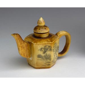 An engraved bone teapot;XX ... 