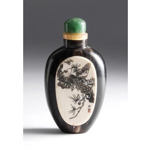 Engraved ivory and wood snuff bottle;XX ... 
