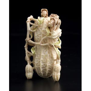 A vegetable carved ivory snuff bottle and ... 