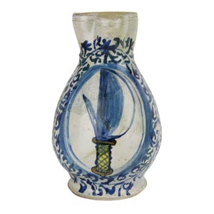Mojolica flagon painted in blue and yellow. ... 