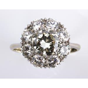 DIAMOND RING; flower motif set  ... 