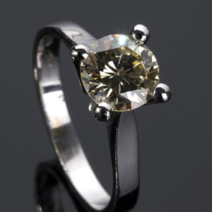 DIAMOND RING; a solitaire diamond ... 