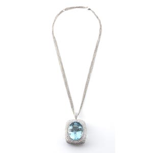 AQUAMARINE AND DIAMOND NECKLACE; realized in ... 