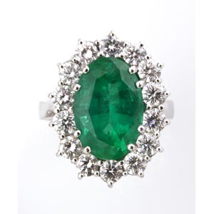 EMERALD AND DIAMOND RING; set with ... 