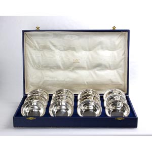 A SET OF  12 SOLID 800 ‰ SILVER  BOWLS -  ... 