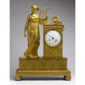 A FRENCH GILT-BRONZE TABLE CLOCK - LEPINE, ... 