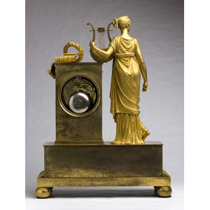 A FRENCH GILT-BRONZE TABLE CLOCK - ... 