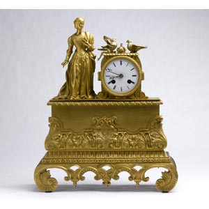 A FRENCH GILT-BRONZE TABLE CLOCK - FRANCE, ... 