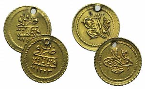 Lot of 2 AV Islamic coins (pierced), to be ... 
