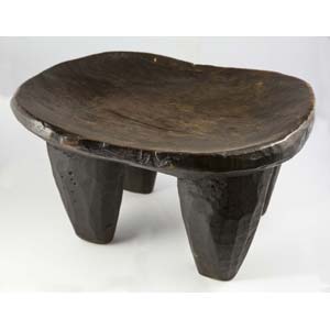 Ancient wooden stool with four ... 