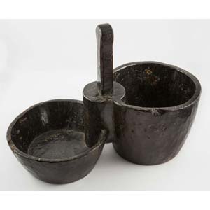 Wooden vessel with two small ... 