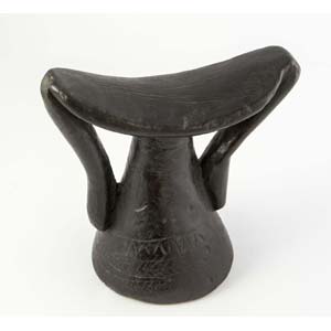 Small african wooden headrest with geometric ... 
