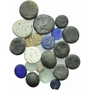 A Large group of 20 glass play  tokens. 