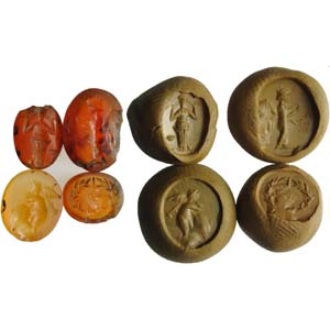 Lotto di quattro intagli romani in corniola. ... 