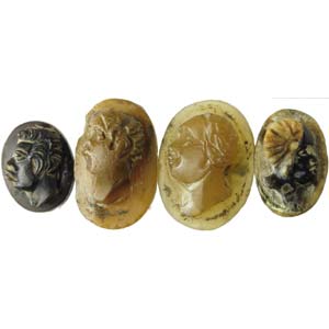 Lot of four agate cameos. Moor heads. ... 