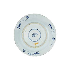 A LARGE BLUE AND WHITE DISH WITH ... 