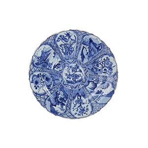 A LARGE BLUE AND WHITE DISH WITH BARBED ... 
