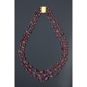 18K GOLD AND TORMALINE NECKLACE
three ... 