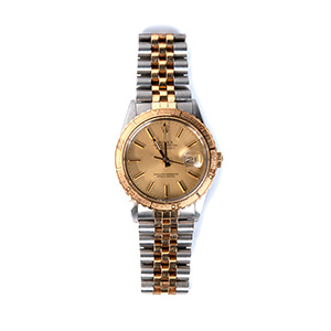An 18K gold/ Stainless steel Wristwatch, by ... 