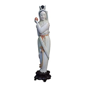A PAINTED IVORY CARVING OF A STANDING FEMALE ... 