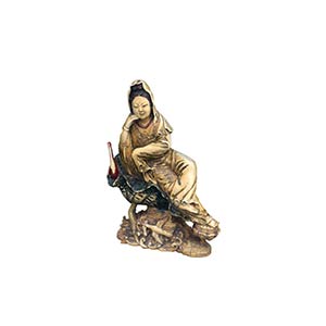 A PAINTED IVORY CARVING OF A SEATED ... 