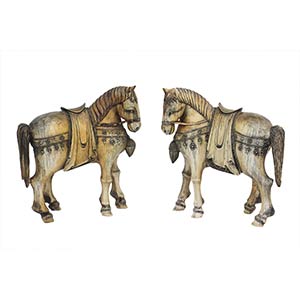 A PAIR OF IVORY CARVING OF TWO HORSESEarly ... 