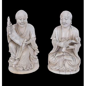 A PAIR OF EARLY 20TH CENTURY CHINESE IVORY ... 