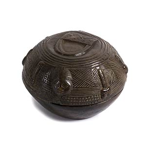 A YORUBA WOODEN ROUND RITUAL BOWL WITH LID ... 