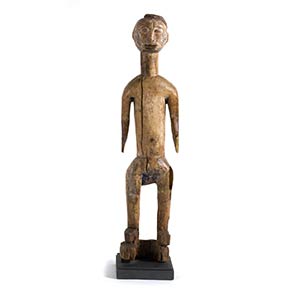 AN IDOMA WOODEN STANDING MALE ... 