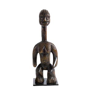 AN IDOMA WOODEN STANDING FEMALE FIGURE FROM ... 