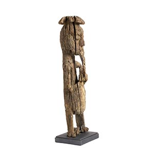 AN ORON WOODEN FIGURE OF A ... 
