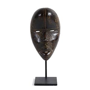 A DAN WOODEN MASK FROM IVORY ... 