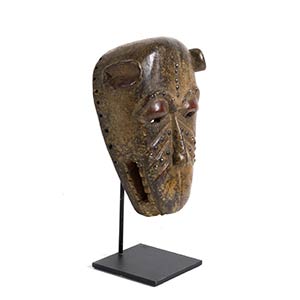 A BAULE WOODEN MASK FROM IVORY ... 