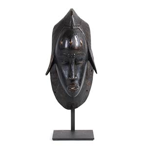 A BAULE WOODEN FEMALE PORTRAIT MASK FROM ... 