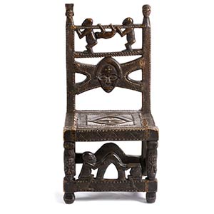 A CHOKWE WOODEN AND BRASS THRONE ... 