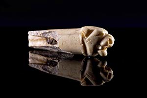 Roman bone handle knifeon the shape of a ... 