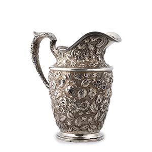 A STERLING SILVER  (925‰) WATER PITCHER ... 