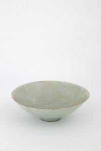 A QINGBAI-GLAZED CARVED ‘FISHES’ BOWL, ... 