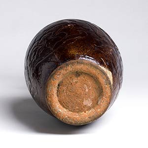 A RUSSET-BROWN-GLAZED CARVED WATER ... 
