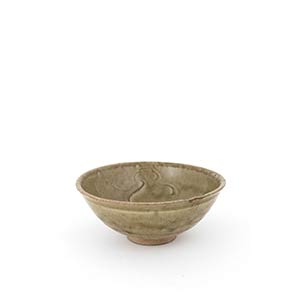 A CÉLADON-GLAZED INCISED BOWL, WANSong ... 