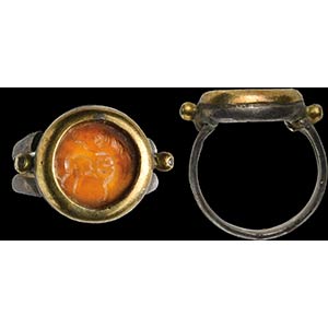 A roman carnelian intaglio mounted in a ring ... 