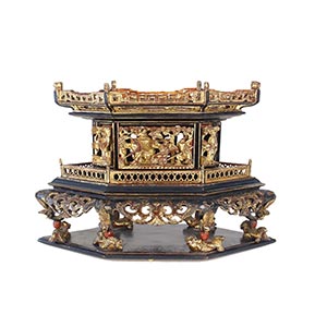 A CARVED, LACQUERED AND GILT WOOD ALTAR ... 