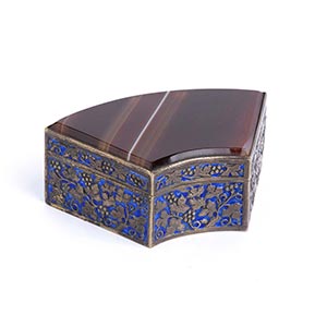 A GILT AND ENAMELLED SILVER FAN-SHAPED BOX ... 
