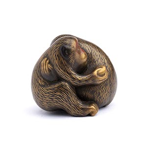 A LACQUERED AND GILT WOOD NETSUKE OF TWO ... 