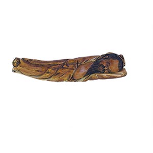 A LARGE IVORY CARVING OF A SLEEPING ... 