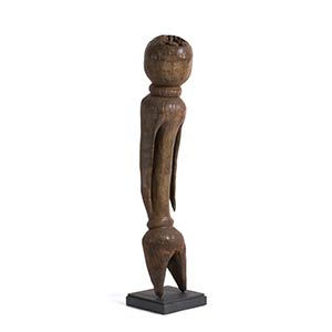 A WOODEN FIGURE OF A STANDING ... 