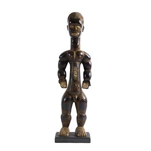 A WOODEN FIGURE OF A STANDING ANCESTOR Ivory ... 