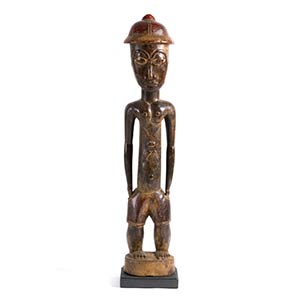 A WOODEN STANDING MALE FIGURE, ... 